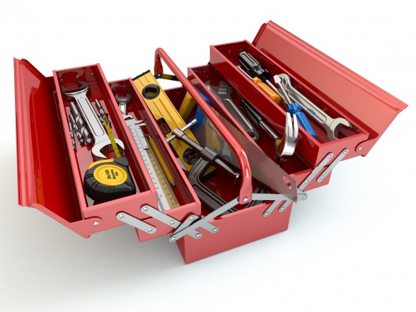 Toolbox with tools on white isolated background.